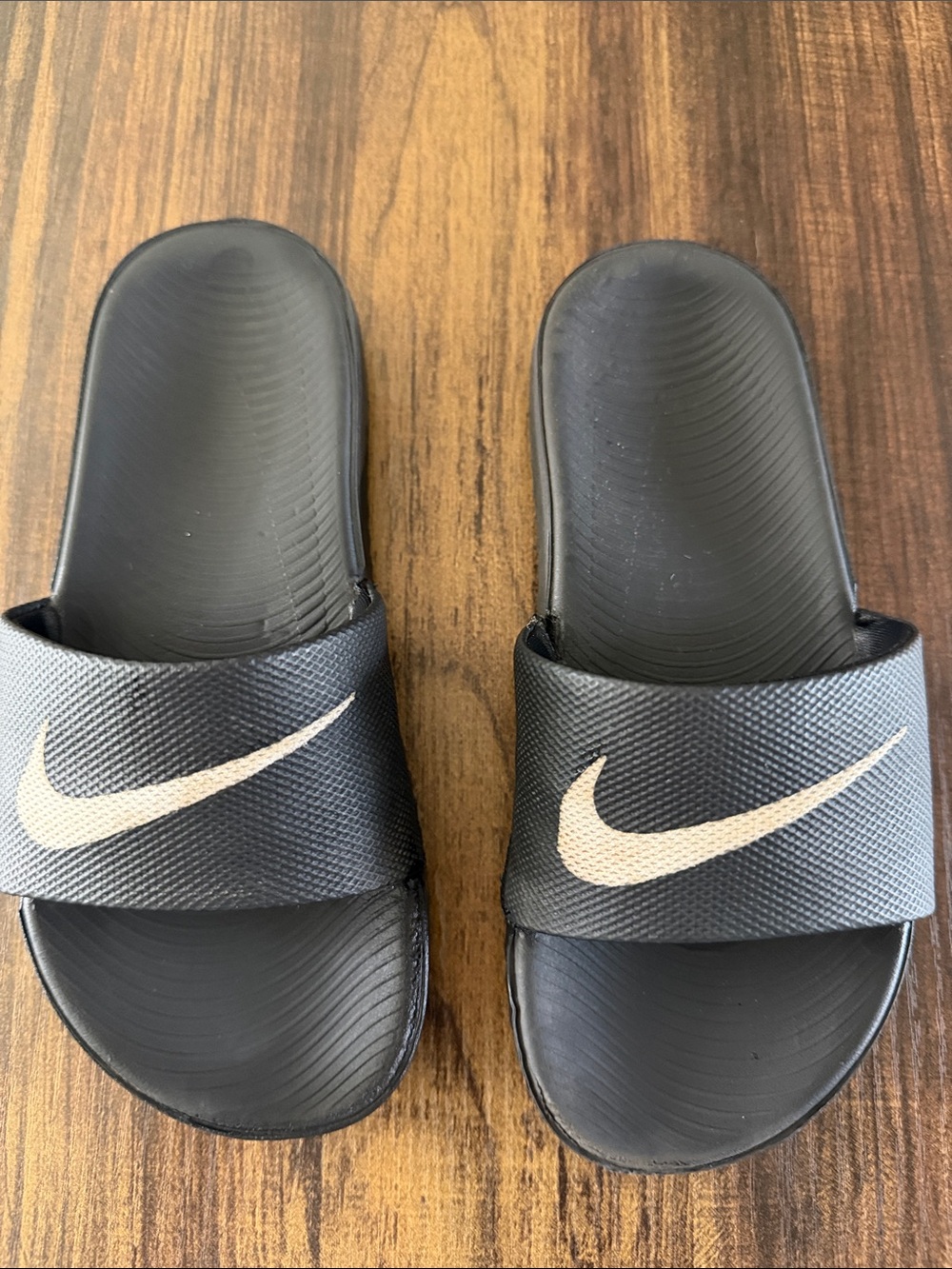 Nike Black Slide Sandals with Cream Swoosh